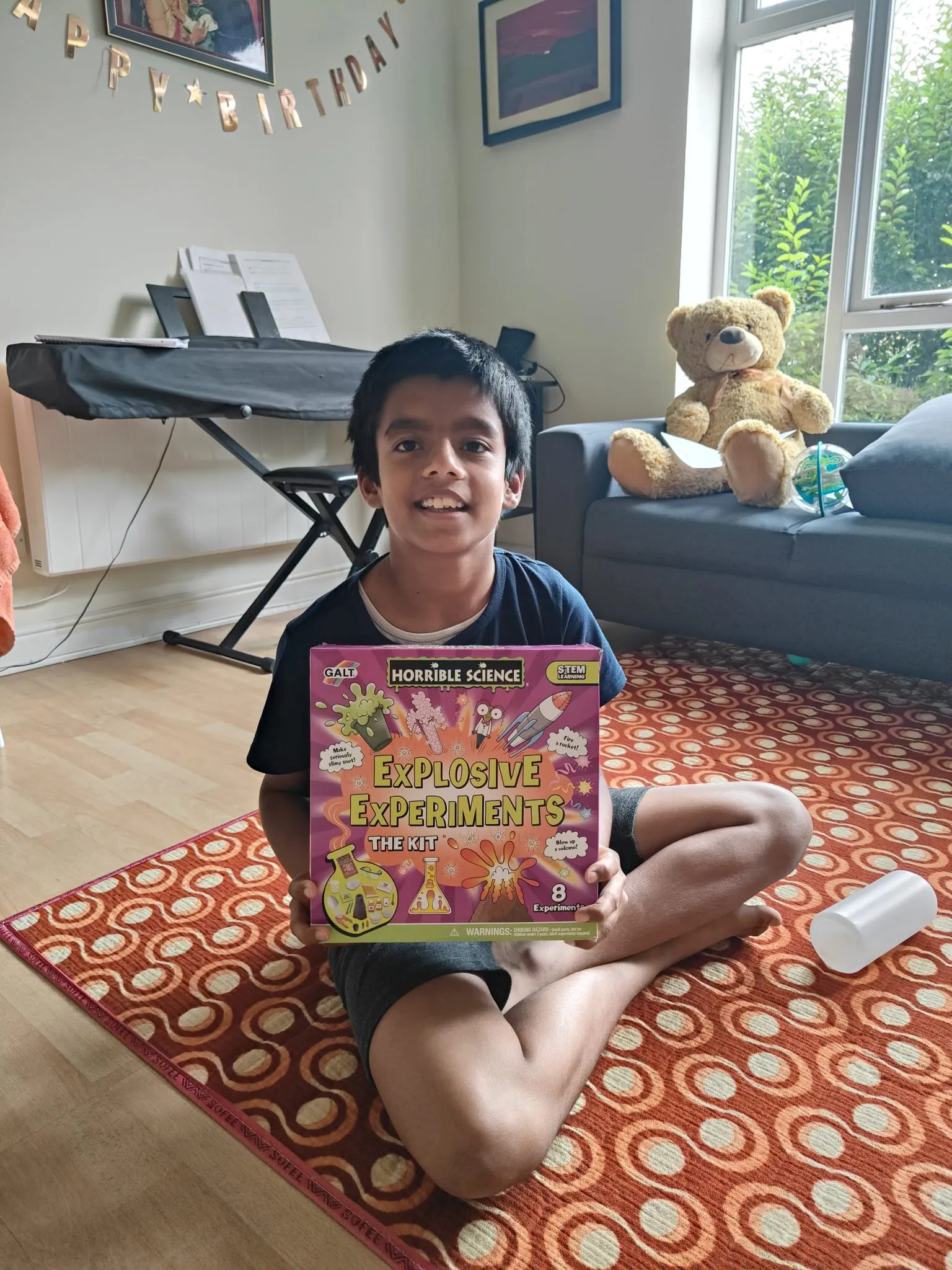 Exam Happy weekly prize winner with their science kit