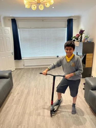 Exam Happy weekly prize winner with their stunt scooter